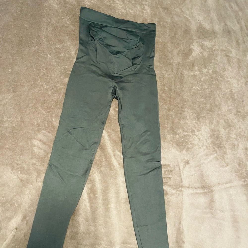 Blanqi Belly Support maternity leggings in a greenish color